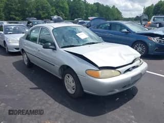 ✅ 1999 Ford Escort LX • VIN: 1FAFP10P6XW164410 • Lot: 42935825. Listed on IAAI with 159,409 mi. Free auction sales archive from the USA and detailed vehicle history report at DreamBid. Image 1.