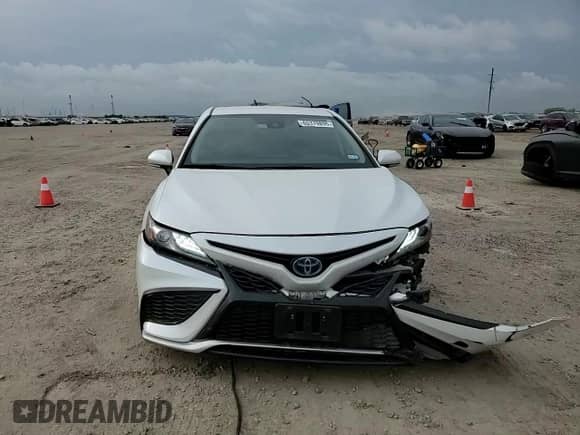 2021 Toyota Camry Hybrid XSE с VIN 4T1K31AK7MU028992, выставлен на аукционе Copart как лот 65379895 с пробегом 62 735 миль миль и Списание • Salvage title. История ставок и продаж доступна на DreamBid. Изображение 13.