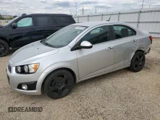 2013 Chevrolet Sonic LTZ с VIN 1G1JE5SH7D4152807, выставлен на аукционе Copart как лот 58600395 с пробегом 129 542 миль миль и Списание • Salvage title. История ставок и продаж доступна на DreamBid. Изображение 1.