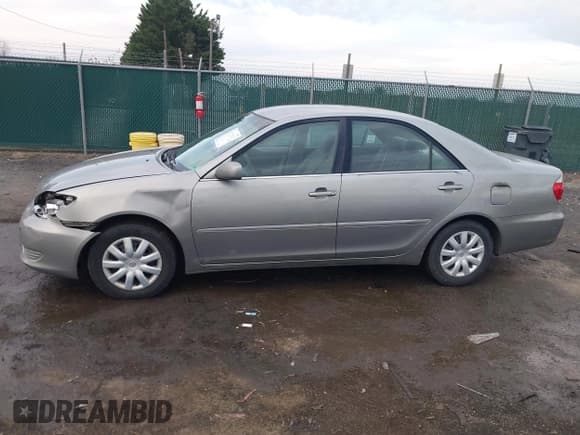 ✅ 2005 Toyota Camry LE • VIN: 4T1BE30KX5U955364 • Lot: 43717827. Listed on IAAI with 216,992 mi. Free auction sales archive from the USA and detailed vehicle history report at DreamBid. Image 14.