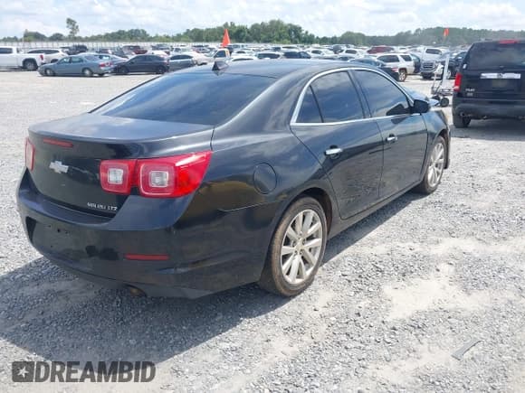 ✅ 2013 Chevrolet Malibu LTZ • VIN: 1G11H5SA6DF190026 • Lot: 42984401. Listed on IAAI with Not provided. Free auction sales archive from the USA and detailed vehicle history report at DreamBid. Image 4.