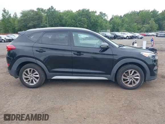 2018 Hyundai Tucson SEL z VIN KM8J33A4XJU654699, wystawiony jako IAAI lot #42993670 z przebiegiem 89 961 mil mil oraz . Historia ofert i sprzedaży dostępna na DreamBid. Obrazek 13.