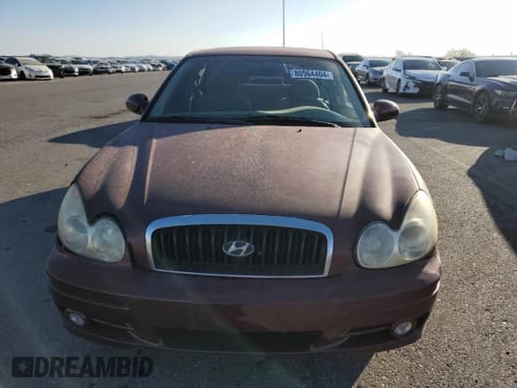 2002 Hyundai Sonata с VIN KMHWF25S12A577255, выставлен на аукционе Copart как лот 80964404 с пробегом 161 953 миль миль и Списание • Salvage title. История ставок и продаж доступна на DreamBid. Изображение 5.
