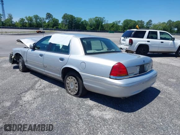 ✅ 2003 Ford Police Interceptor Street Appear • VIN: 2FAFP71W93X101292 • Lot: 40263949. Listed on IAAI with 255,111 mi. Free auction sales archive from the USA and detailed vehicle history report at DreamBid. Image 3.