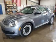 ✅ 2013 Volkswagen Beetle Fender Edition • VIN: 3VWJP7AT5DM679698 • Lot: 48974905. Listed on Copart with 89,437 mi. Free auction sales archive from the USA and detailed vehicle history report at DreamBid. Image 1.