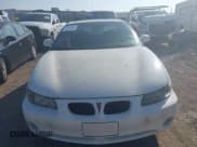 ✅ 2002 Pontiac Grand Prix SE • VIN: 1G2WK52J42F256086 • Lot: 42426082. Wystawiony na IAAI z przebiegiem 151 597 mil. Bezpłatny archiwum sprzedaży aukcyjnych z USA i szczegółowy raport historii pojazdu na DreamBid. Zdjęcie 6.