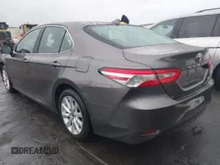 ✅ 2020 Toyota Camry LE • VIN: 4T1C11AK3LU996418 • Lot: 43528082. Listed on IAAI with 33,532 mi. Free auction sales archive from the USA and detailed vehicle history report at DreamBid. Image 3.