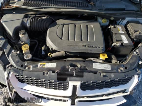 2019 Dodge Grand Caravan GT z VIN 2C4RDGEG2KR647664, wystawiony jako Copart lot #70319365 z przebiegiem 163 528 mil mil oraz Szkoda całkowita • Salvage title. Historia ofert i sprzedaży dostępna na DreamBid. Obrazek 12.