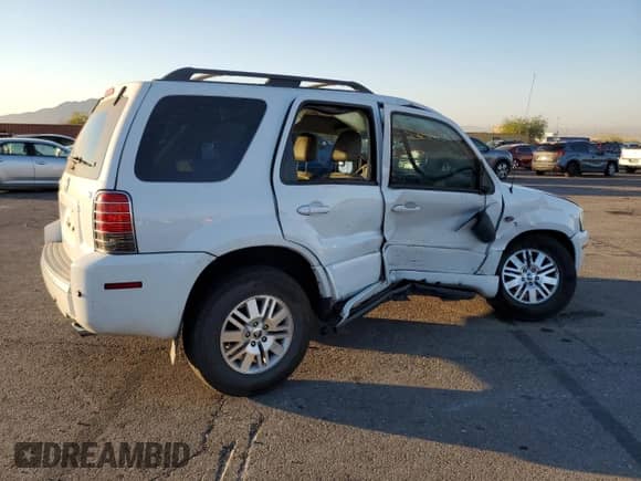 2005 Mercury Mariner Luxury с VIN 4M2CU56175DJ16949, выставлен на аукционе Copart как лот 41901845 с пробегом 104 948 миль миль и Списание • Salvage title. История ставок и продаж доступна на DreamBid. Изображение 3.