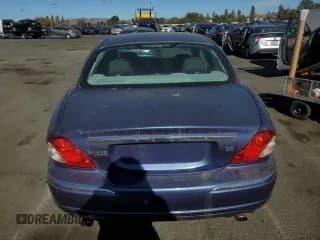 ✅ 2004 Jaguar X-Type • VIN: SAJEA51C04WD74995 • Лот: 77216404. Опубликован ранее на Copart с пробегом 87 853 миль. Бесплатный доступ к архиву аукционных продаж из США и подробный отчёт об истории автомобиля на DreamBid. Изображение 6.
