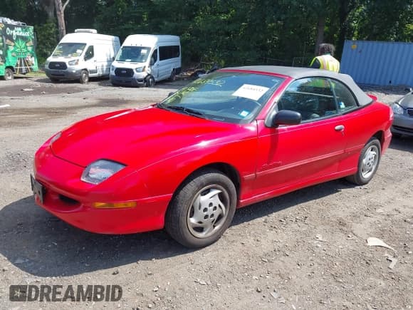 ✅ 1996 Pontiac Sunfire • VIN: 4G2JB3245TB202537 • Lot: 42684532. Listed on IAAI with 91,251 mi. Free auction sales archive from the USA and detailed vehicle history report at DreamBid. Image 2.