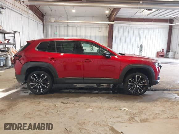 ✅ 2023 Mazda CX-50 Premium • VIN: 7MMVABDY8PN104506 • Лот: 43157985. Опубликован ранее на IAAI с пробегом 53 633 миль. Бесплатный доступ к архиву аукционных продаж из США и подробный отчёт об истории автомобиля на DreamBid. Изображение 13.