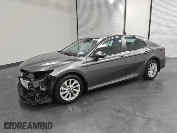 2023 Toyota Camry LE с VIN 4T1C11BKXPU085068, выставлен на аукционе Copart как лот 84569265 с пробегом 48 120 миль миль и Чистый • Clean title. История ставок и продаж доступна на DreamBid. Изображение 1.