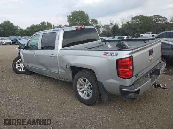 2018 Chevrolet Silverado 1500 LT с VIN 3GCUKREC2JG503173, выставлен на аукционе Copart как лот 80928005 с пробегом 107 558 миль миль и Списание • Salvage title. История ставок и продаж доступна на DreamBid. Изображение 2.