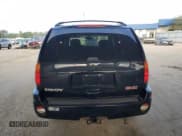 ✅ 2005 GMC Envoy SLE • VIN: 1GKDS13S652105835 • Лот: 67188425. Опубликован ранее на Copart с пробегом 176 614 миль. Бесплатный доступ к архиву аукционных продаж из США и подробный отчёт об истории автомобиля на DreamBid. Изображение 6.