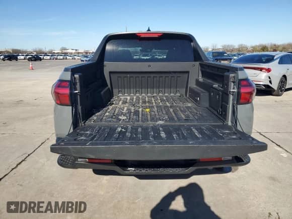 2024 Hyundai Santa Cruz SEL с VIN 5NTJBDDE8RH112428, выставлен на аукционе Copart как лот 86798254 с пробегом 11 888 миль миль и Списание • Salvage title. История ставок и продаж доступна на DreamBid. Изображение 6.