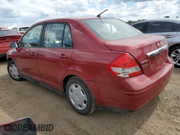 ✅ 2009 Nissan Versa S • VIN: 3N1BC11E09L401910 • Лот: 69839905. Опубликован ранее на Copart с пробегом 136 232 миль. Бесплатный доступ к архиву аукционных продаж из США и подробный отчёт об истории автомобиля на DreamBid. Изображение 2.