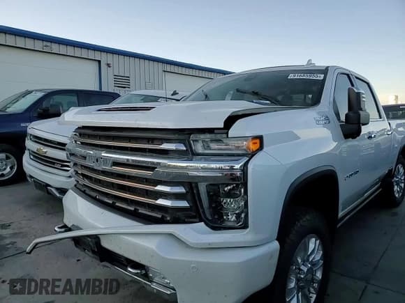 ✅ 2021 Chevrolet Silverado 2500HD High Country • VIN: 1GC4YREY3MF265561 • Лот: 91685955. Опубликован ранее на Copart с пробегом 67 494 миль. Бесплатный доступ к архиву аукционных продаж из США и подробный отчёт об истории автомобиля на DreamBid. Изображение 13.