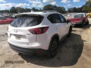 ✅ 2016 Mazda CX-5 Grand Touring • VIN: JM3KE2DY0G0695894 • Lot: 43441374. Wystawiony na IAAI z przebiegiem 112 838 mil. Bezpłatny archiwum sprzedaży aukcyjnych z USA i szczegółowy raport historii pojazdu na DreamBid. Zdjęcie 4.