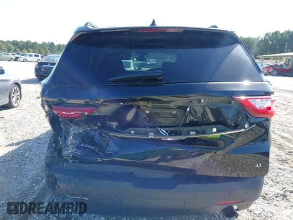 ✅ 2021 Chevrolet Traverse LT • VIN: 1GNERHKW4MJ260176 • Lot: 43343332. Wystawiony na IAAI z przebiegiem 126 672 mil. Bezpłatny archiwum sprzedaży aukcyjnych z USA i szczegółowy raport historii pojazdu na DreamBid. Zdjęcie 16.