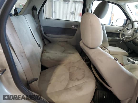 ✅ 2010 Mercury Mariner • VIN: 4M2CN9BG5AKJ11799 • Lot: 46441995. Listed on Copart with 125,871 mi. Free auction sales archive from the USA and detailed vehicle history report at DreamBid. Image 12.