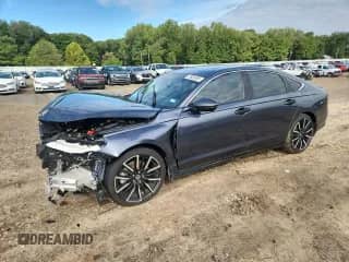 2023 Honda Accord Touring z VIN 1HGCY2F87PA041004, wystawiony jako Copart lot #70926895 z przebiegiem Nie podano mil oraz Szkoda całkowita • Salvage title. Historia ofert i sprzedaży dostępna na DreamBid. Obrazek 1.
