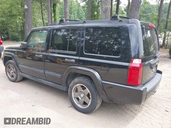 ✅ 2006 Jeep Commander • VIN: 1J8HH48N56C126051 • Lot: 42711962. Listed on IAAI with 210,509 mi. Free auction sales archive from the USA and detailed vehicle history report at DreamBid. Image 3.