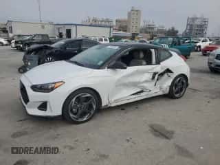 2019 Hyundai Veloster Turbo R-Spec с VIN KMHTH6AB0KU013220, выставлен на аукционе Copart как лот 77102034 с пробегом 82 799 миль миль и Списание • Salvage title. История ставок и продаж доступна на DreamBid. Изображение 1.