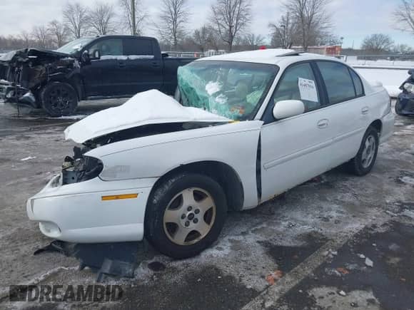 2003 Chevrolet Malibu LS z VIN 1G1NE52J53M540248, wystawiony jako IAAI lot #41407016 z przebiegiem Nie podano mil oraz . Historia ofert i sprzedaży dostępna na DreamBid. Obrazek 2.