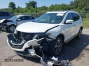 ✅ 2017 Nissan Rogue SV • VIN: JN8AT2MT9HW151511 • Lot: 43174081. Listed on IAAI with 104,937 mi. Free auction sales archive from the USA and detailed vehicle history report at DreamBid. Image 17.