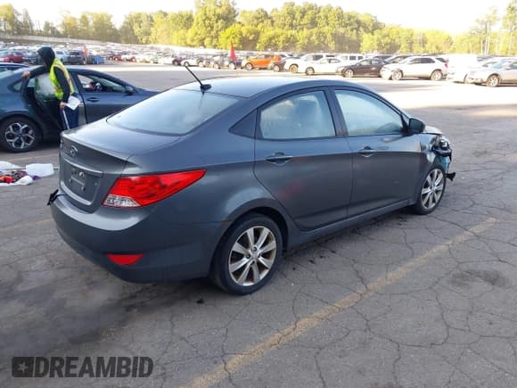 ✅ 2013 Hyundai Accent GLS • VIN: KMHCU4AE6DU302793 • Lot: 43160472. Listed on IAAI with 98,187 mi. Free auction sales archive from the USA and detailed vehicle history report at DreamBid. Image 4.