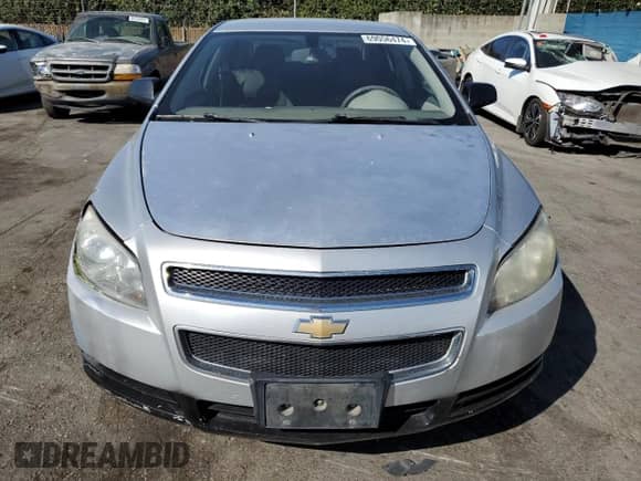 2011 Chevrolet Malibu 1LS z VIN 1G1ZB5E15BF323713, wystawiony jako Copart lot #69056474 z przebiegiem 144 483 mil mil oraz Szkoda całkowita • Salvage title. Historia ofert i sprzedaży dostępna na DreamBid. Obrazek 5.