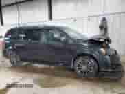 2015 Dodge Grand Caravan R/T with VIN 2C4RDGEG5FR736036, listed as a Copart auction lot 90314845 with 113,784 mi miles and Salvage title. Bid and sale history available at DreamBid. Image 4.