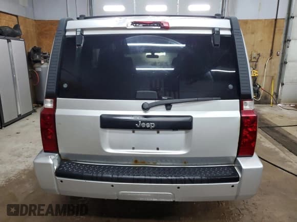 ✅ 2010 Jeep Commander Sport • VIN: 1J4RG4GK9AC124439 • Lot: 54749315. Listed on Copart with 150,204 mi. Free auction sales archive from the USA and detailed vehicle history report at DreamBid. Image 6.