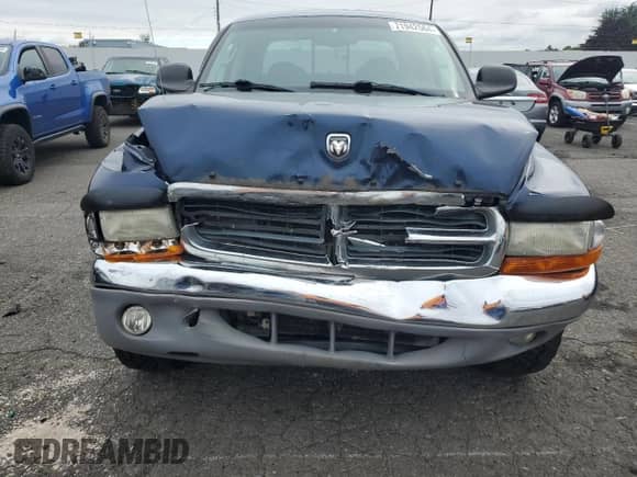 2004 Dodge Dakota SLT z VIN 1D7HG48N94S688652, wystawiony jako Copart lot #71942564 z przebiegiem 141 942 mil mil oraz Szkoda całkowita • Salvage title. Historia ofert i sprzedaży dostępna na DreamBid. Obrazek 5.