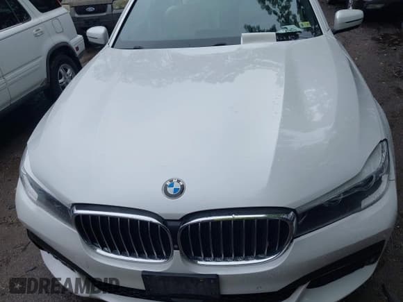 ✅ 2017 BMW 7 Series 740i • VIN: WBA7E2C58HG740141 • Лот: 42526565. Опубликован ранее на IAAI с пробегом 103 992 миль. Бесплатный доступ к архиву аукционных продаж из США и подробный отчёт об истории автомобиля на DreamBid. Изображение 6.