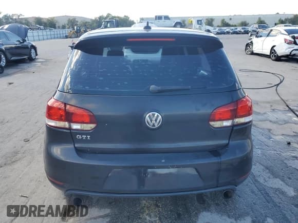 ✅ 2013 Volkswagen Golf GTI • VIN: WVWHD7AJ6DW141567 • Lot: 85427175. Listed on Copart with 104,387 mi. Free auction sales archive from the USA and detailed vehicle history report at DreamBid. Image 6.