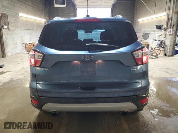 ✅ 2018 Ford Escape SE • VIN: 1FMCU9GD6JUB22477 • Lot: 92275205. Wystawiony na Copart z przebiegiem 103 561 mil. Bezpłatny archiwum sprzedaży aukcyjnych z USA i szczegółowy raport historii pojazdu na DreamBid. Zdjęcie 6.