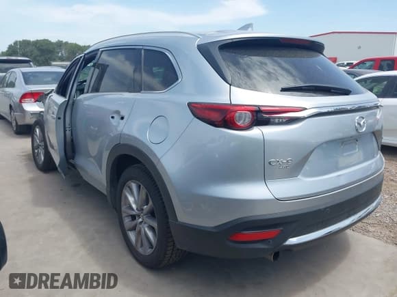 ✅ 2021 Mazda CX-9 Grand Touring • VIN: JM3TCBDY2M0523033 • Lot: 42786709. Wystawiony na IAAI z przebiegiem 72 889 mil. Bezpłatny archiwum sprzedaży aukcyjnych z USA i szczegółowy raport historii pojazdu na DreamBid. Zdjęcie 3.