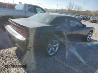 ✅ 2013 Dodge Challenger SXT • VIN: 2C3CDYAGXDH524922 • Lot: 82831684. Wystawiony na Copart z przebiegiem 218 839 mil. Bezpłatny archiwum sprzedaży aukcyjnych z USA i szczegółowy raport historii pojazdu na DreamBid. Zdjęcie 3.