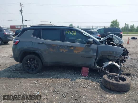 ✅ 2023 Jeep Compass Altitude • VIN: 3C4NJDBN7PT515769 • Lot: 42869238. Listed on IAAI with 50,455 mi. Free auction sales archive from the USA and detailed vehicle history report at DreamBid. Image 13.
