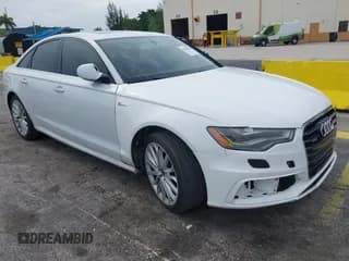 ✅ 2014 Audi A6 Prestige • VIN: WAUHGAFC1EN037698 • Lot: 42605685. Listed on IAAI with 128,051 mi. Free auction sales archive from the USA and detailed vehicle history report at DreamBid. Image 1.