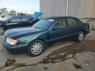 ✅ 1998 Toyota Avalon XL • VIN: 4T1BF18B1WU243770 • Лот: 57039794. Опубликован ранее на Copart с пробегом 131 478 миль. Бесплатный доступ к архиву аукционных продаж из США и подробный отчёт об истории автомобиля на DreamBid. Изображение 1.