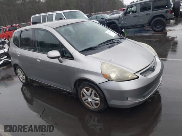 ✅ 2007 Honda Fit • VIN: JHMGD37457S001803 • Lot: 43876947. Listed on IAAI with 211,567 mi. Free auction sales archive from the USA and detailed vehicle history report at DreamBid. Image 1.