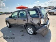 ✅ 2006 Ford Escape XLS • VIN: 1FMYU02Z26KB66967 • Lot: 69556315. Listed on Copart with 256,470 mi. Free auction sales archive from the USA and detailed vehicle history report at DreamBid. Image 2.