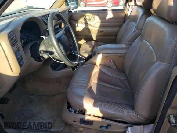 1999 Chevrolet Blazer LS with VIN 1GNDT13WXX2105262, listed as a Copart auction lot 77536214 with 155,108 mi miles and Salvage title. Bid and sale history available at DreamBid. Image 7.