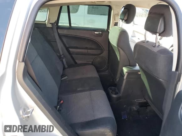 ✅ 2011 Dodge Caliber Heat • VIN: 1B3CB5HA0BD241958 • Лот: 87248944. Опубликован ранее на Copart с пробегом 130 747 миль. Бесплатный доступ к архиву аукционных продаж из США и подробный отчёт об истории автомобиля на DreamBid. Изображение 11.