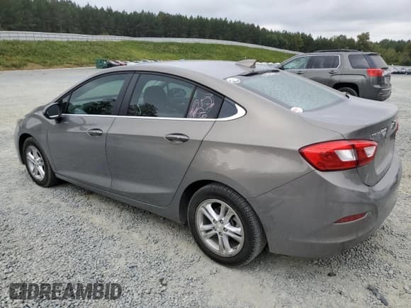 ✅ 2018 Chevrolet Cruze LT • VIN: 1G1BE5SMXJ7246580 • Lot: 81863505. Listed on Copart with 93,506 mi. Free auction sales archive from the USA and detailed vehicle history report at DreamBid. Image 2.