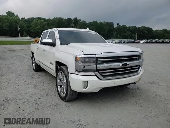 ✅ 2016 Chevrolet Silverado 1500 High Country • VIN: 3GCPCTEC5GG181483 • Lot: 59668255. Wystawiony na Copart z przebiegiem 143 215 mil. Bezpłatny archiwum sprzedaży aukcyjnych z USA i szczegółowy raport historii pojazdu na DreamBid. Zdjęcie 13.