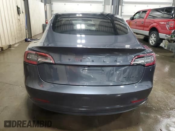 ✅ 2018 Tesla Model 3 Long Range Battery • VIN: 5YJ3E1EBXJF090615 • Лот: 92650005. Опубликован ранее на Copart с пробегом 65 939 миль. Бесплатный доступ к архиву аукционных продаж из США и подробный отчёт об истории автомобиля на DreamBid. Изображение 6.